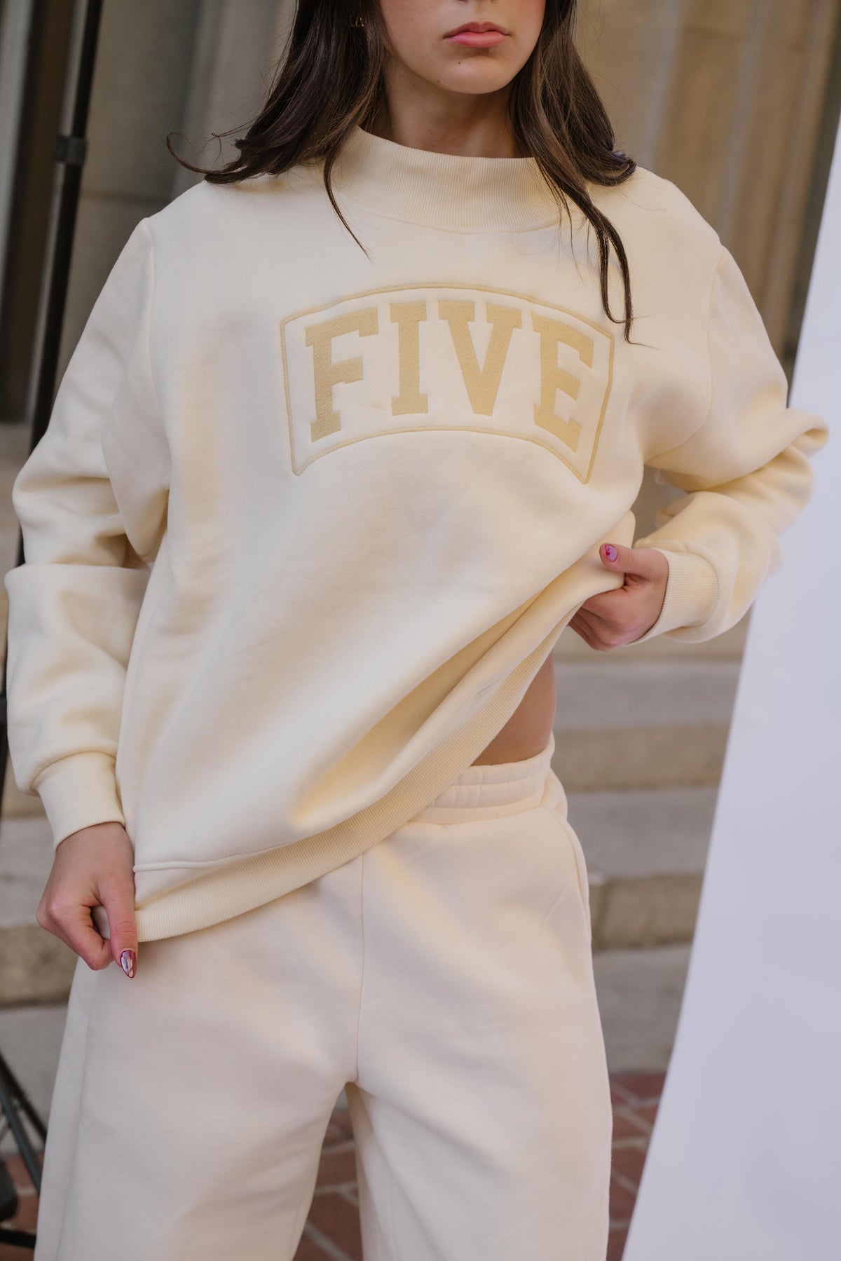 kids, A girl wearing a butter-yellow colored sweatshirt with 'FIVE' embroidered in a matching tone on the chest, paired with matching yellow sweatpants.